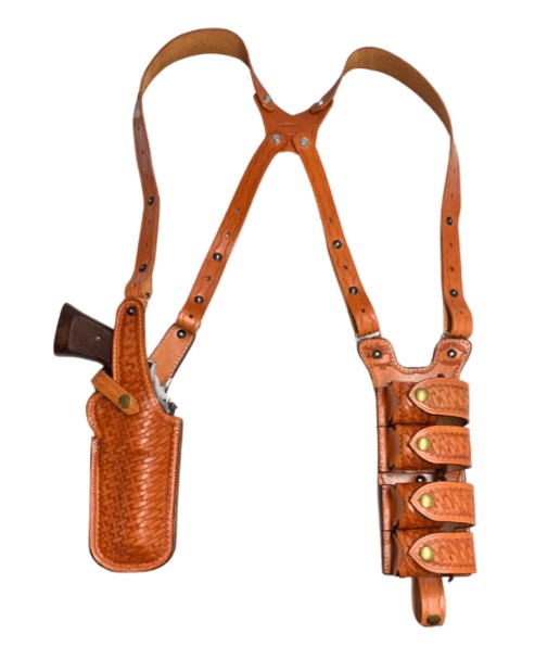 Vertical Double Shoulder Quad Holster.  Designed in response to customers heading to combat zones, the Quad speed loader carrier also works very well for those who must be discreetly yet heavily armed. It holds four speed loaders in horizontal position, w